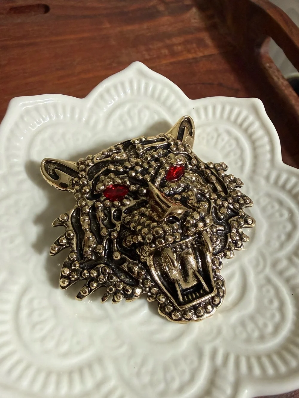 gold-tone metal roaring tiger head brooch red rhinestone eyes textured detail